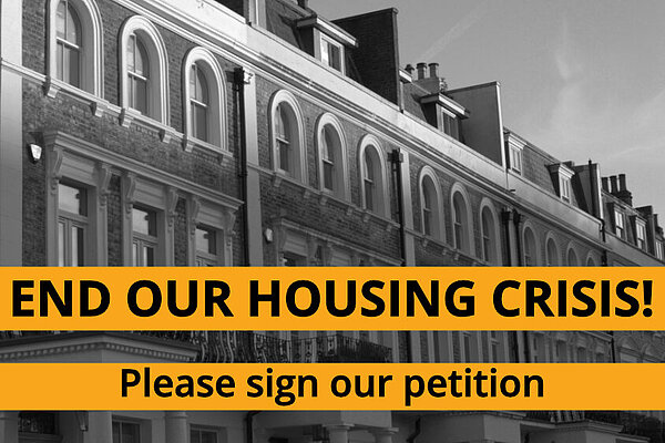 A multi-storey housing block in black and white, with End our housing crisis: please sign our petition written below
